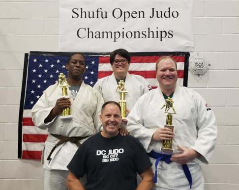 Lance (top), with DC Judo's Russell, Dennis, and Nelson after sweeping their division.